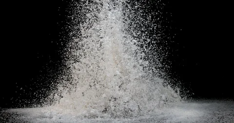 Coconut, cocos nucifera, Powder Exploding against Black Background, slow moti Stock Footage 112347342