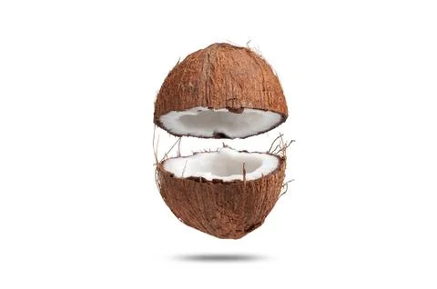 Coconut is divided into two halves isolated on a white background Stock Photos