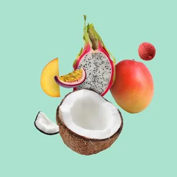 Coconut, dragonfruit, mango, lychee and maracuja in air on turquoise backgr.. Stock Photos