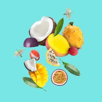 Coconut, dragonfruit, mango, lychees and maracuja in air on turquoise backg.. Stock Photos
