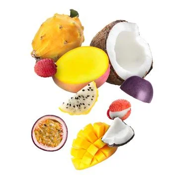 Coconut, dragonfruit, mango, lychees and maracuja in air on white backgroun.. Stock Photos