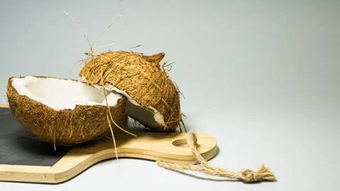Coconut exotic fruit, two halves of fruit shell Stock Photos