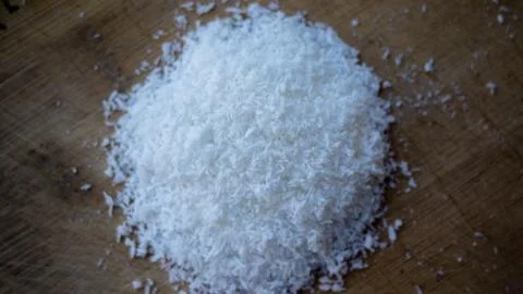Coconut Flakes on brown table 写真素材