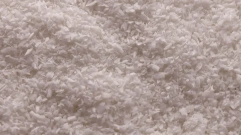 Coconut flakes, rotation in circle. coconut flakes Stock Footage 241247779