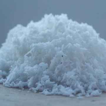 Coconut Flakes on white table 写真素材