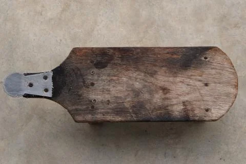 The coconut grater is the tool use for grated coconut fruit at countryside Stock Photos