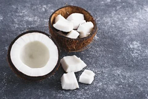 Coconut, half coconut on grey background Foto stock
