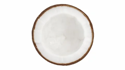 Coconut half, split, rotating on white background Stock Footage 245519809