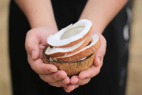 Coconut in the hands Foto stock