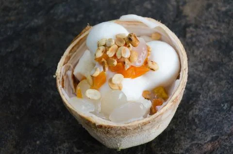 Coconut ice cream in coconut shell. Stock Photos