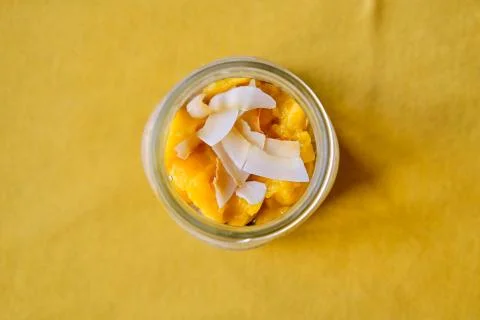 Coconut Mango Chia Seed Pudding in a Glass Jar Stock Photos