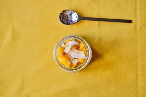 Coconut Mango Chia Seed Pudding in a Glass Jar Stock Photos