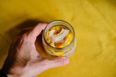 Coconut Mango Chia Seed Pudding in a Glass Jar Stock Photos