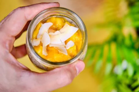 Coconut Mango Chia Seed Pudding in a Glass Jar Stock Photos