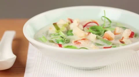 Coconut milk soup with prawns Stock Footage 24672487