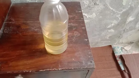Coconut Oil in a Bottle Stock Footage 346990185