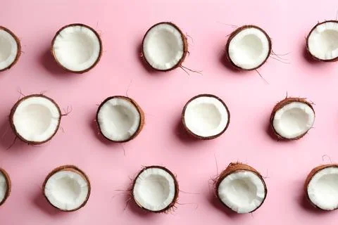 Coconut pattern on color background, flat lay Stock Photos