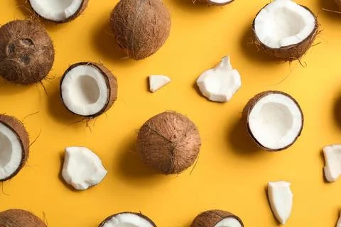Coconut pattern on color background, flat lay Stock Photos