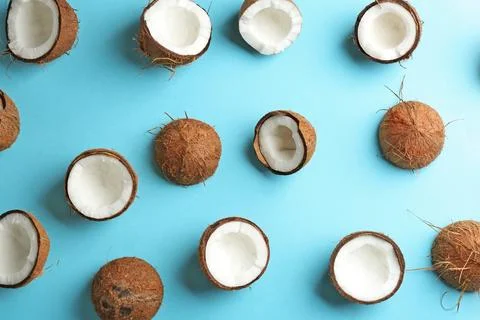 Coconut pattern on color background, flat lay Stockfoto's