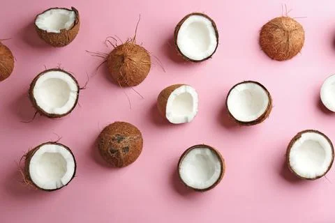 Coconut pattern on color background, flat lay Stockfoto's