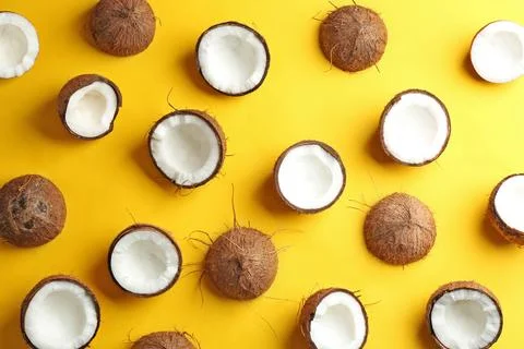Coconut pattern on color background, flat lay Stockfoto's