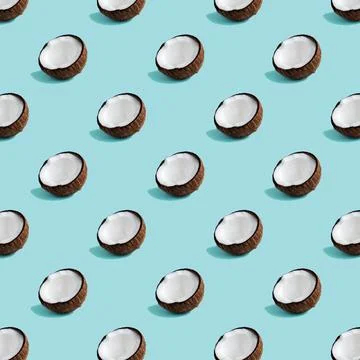 Coconut pattern on green background. Stock Photos