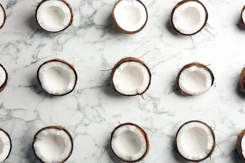 Coconut pattern on marble background, flat lay Stock Photos