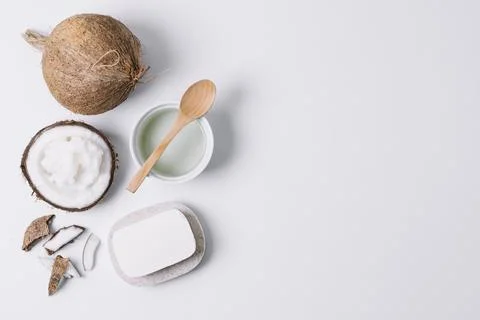 Coconut products under light with copy space. High quality photo Stock Photos