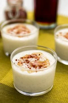 Coconut rice pudding vertical view. Stock Photos