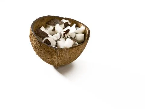 Coconut shell filled with coconut Stock Photos
