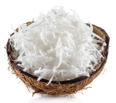 Coconut shell filled with shredded white coconut Stock-Fotos