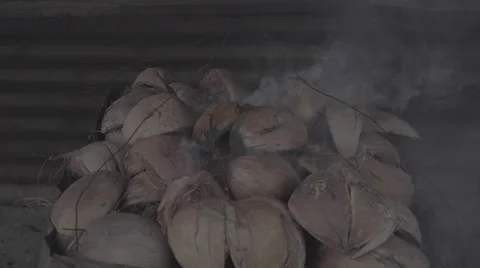 Coconut shell on fire Stock Footage