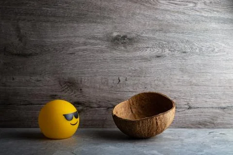 Coconut shell with smile lamp Stock Photos