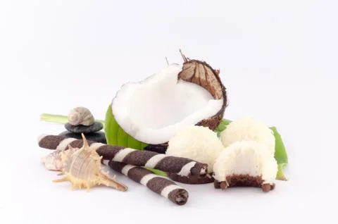 Coconut, shells and coconut sweets Stock Photos
