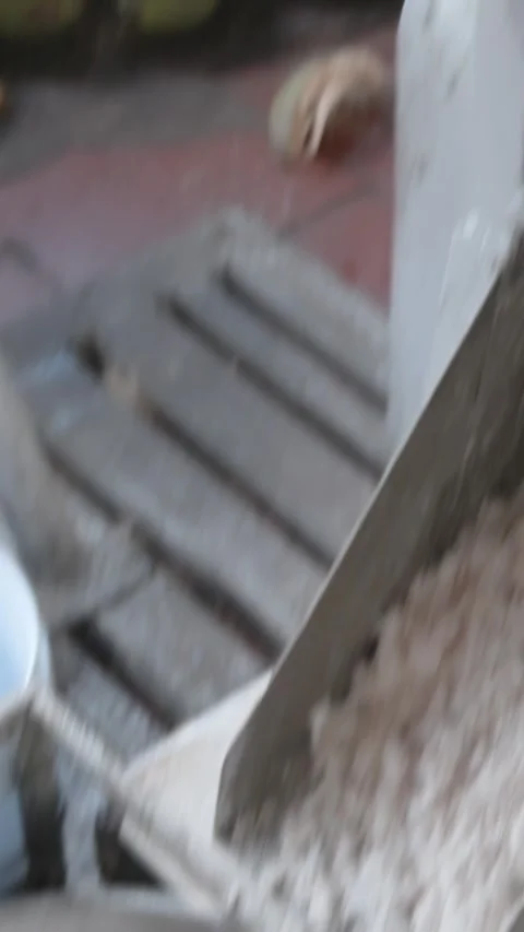 Coconut shredding machine processing fresh coconut in a kitchen in Vietnam Stock Footage 335050735