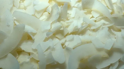 Coconut slices background Video stock 115423685