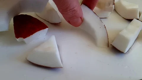 Coconut slices, slow-motion shooting, pouring water drops hand Video stock 89711720