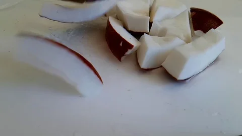 Coconut slices, slow-motion shooting, falls Stock Footage 89711739
