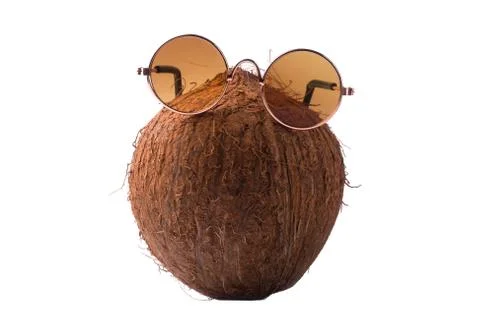 Coconut with sunglasses Stock Photos