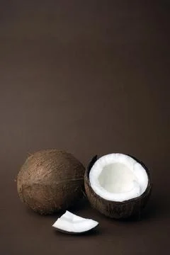 Coconuts on brown chocolate background Stock Photos