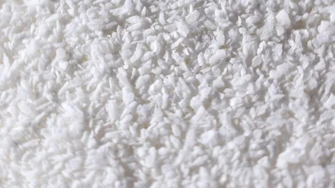 Coconut's chips, on black background Stock Footage 87399703