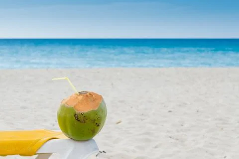 Coconuts cocktail, seashore Stock Photos