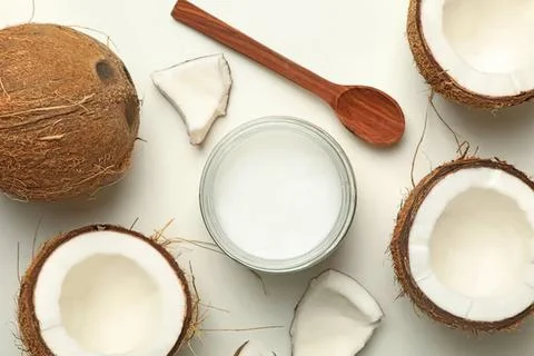 Coconuts with coconut water and shell on white background Fotos de archivo