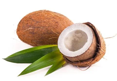 Coconuts with leaves on a white background Stock Photos