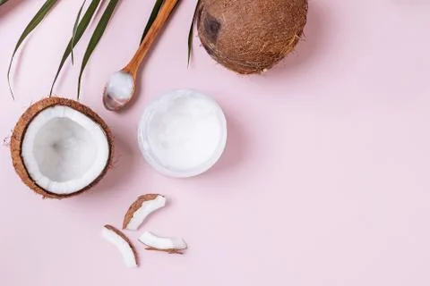 Coconuts on pink background, top view. Stock Photos