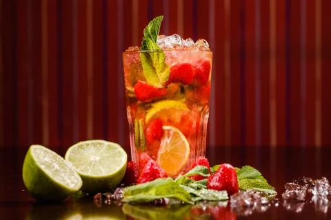 Coctail in a glass with raw fruit Stock Photos