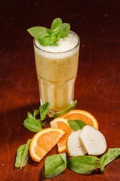 Coctail in a glass with raw fruit Stock Photos
