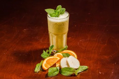 Coctail in a glass with raw fruit Stock Photos
