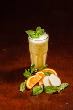 Coctail in a glass with raw fruit Stock Photos