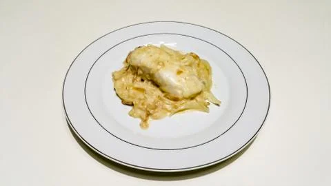 Cod and onions Stock Photos